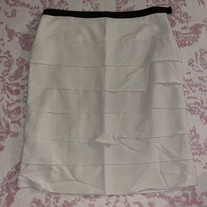 Larry Levine - tan with brown trim skirt